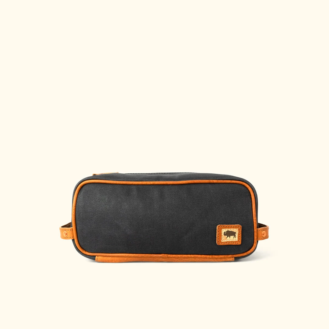 Buffalo Jackson Trading Co. Dakota Waxed Canvas Dopp Kit Toiletry Bag | Navy Charcoal W/ Saddle Tan Leather 3 Buffalo Jackson Trading Co. Dakota Waxed Canvas Dopp Kit Toiletry Bag | Navy Charcoal W/ Saddle Tan Leather