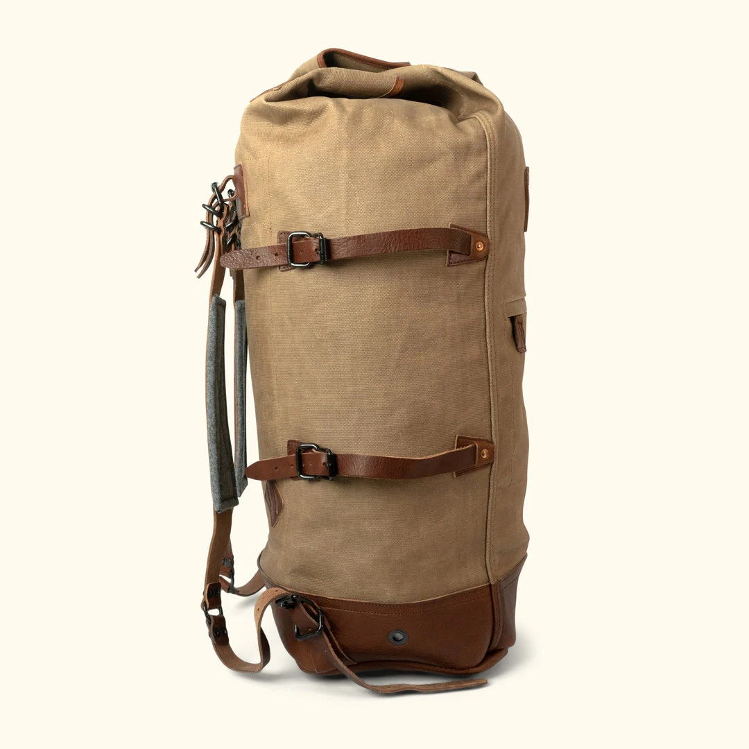 Buffalo Jackson Trading Co. Dakota Waxed Canvas Military Sea Bag Backpack | Field Khaki W/ Chestnut Brown Leather