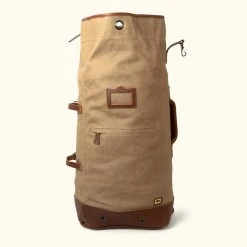 Buffalo Jackson Trading Co. Dakota Waxed Canvas Military Sea Bag Backpack | Field Khaki W/ Chestnut Brown Leather