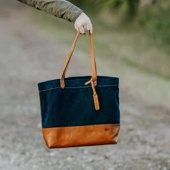 Buffalo Jackson Trading Co. Madison Waxed Canvas Tote Bag | Navy W/ Saddle Tan Leather 25 Buffalo Jackson Trading Co. Madison Waxed Canvas Tote Bag | Navy W/ Saddle Tan Leather